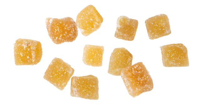 Candied ginger pieces with sugar flying falling isolated on white background.