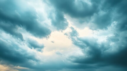 Obraz premium Dramatic Skies: A powerful display of ominous storm clouds fills the frame, their dark, textured forms creating a sense of drama and anticipation.