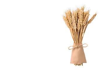 A bundle of wheat stalks tied with brown paper on a black background view
