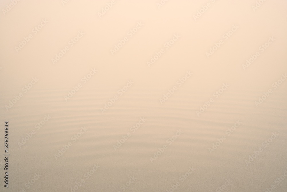 Poster soft light illuminating a calm water surface, creating gentle ripples that enhance a serene and peac