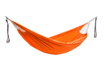A vibrant orange hammock suspended against a stark black background view