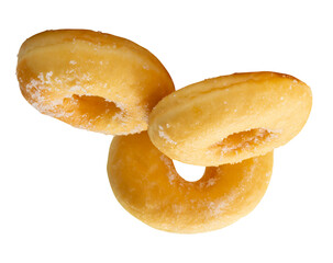 Side view of brown sugar glazed cinnamon donuts in stack isolated with clipping path in png file format