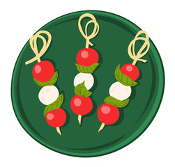 Caprese skewers salad on green flat plate isolated on white background
