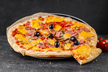 Pizza ham, mushrooms, olives, cheese appetizer vegetable dish fresh delicious gourmet food background on the table rustic food top view copy space