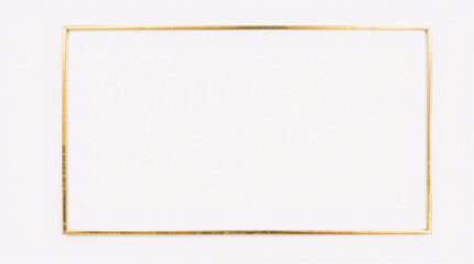 Obraz premium A minimalist gold frame with a clean, elegant design set against a white background.