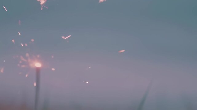 Delicate Pastel Sparks Over Gray Field