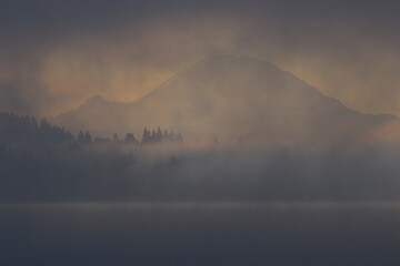 Mt. Rainier in early morning mist, Lake Washington in the foreground
