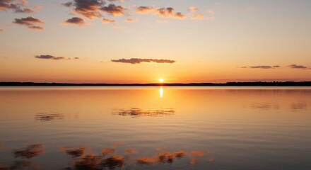Naklejka premium Serene Sunset over Calm Lake Water Golden Hour Landscape