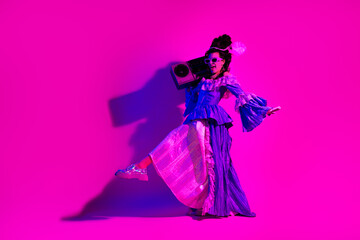 Unique combination of historical attire and modern vibe showcasing a creative and intriguing visual theme in vibrant pink