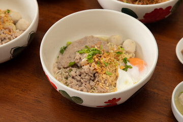 Delectable noodles with meat and egg street market culinary photography