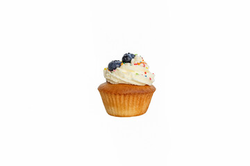 Cupcake on a white background. Sweet food. Confectionery products.