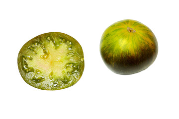 Green tomato whole and cut in half, on white background. Fresh and ripe. Top view