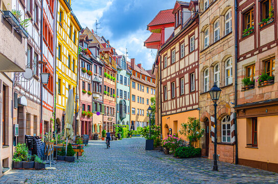 Old town Nuremberg city historical center, pedestrian street Tanner's Lane Wei&szlig;gerbergasse with old medieval buildings colorful half-timbered houses, Middle Franconia region, Bavaria state, Germany