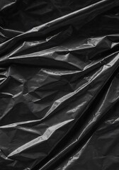 Obraz premium Dark dramatic folds of plastic film texture. AI Generated