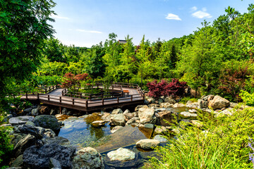 Wooden observation deck in the Japanese garden in Galitsky Park in Krasnodar