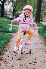 little girl riding a bicycle
