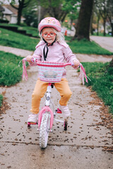 little girl riding a bicycle