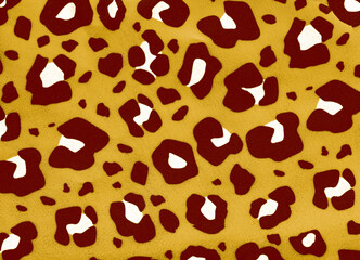 A fun camouflage pattern fabric closeup in yellow red and white