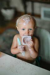 little girl eating yoghurt