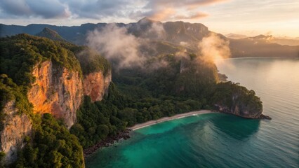 Ao Nang Beach Island Cliff Seascape Krabi Thailand Andaman Sea Travel Vacation Aerial view of a tropical coastline with cliffs, lush greenery, and a serene turquoise sea at sunset.