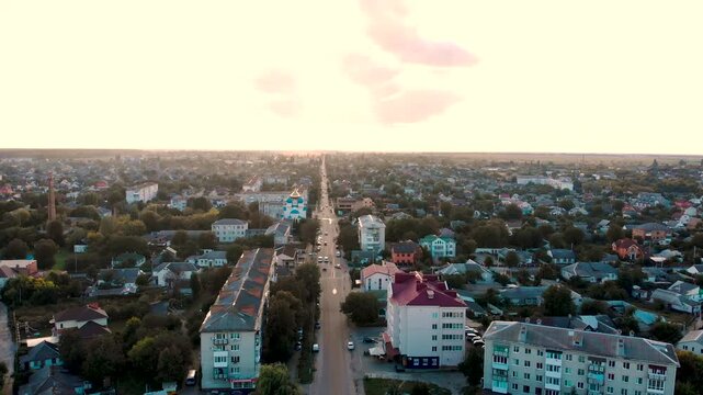 Korostyshiv in autumn. Aerial view of city center, park alley and church. Zhytomyr region, Ukraine