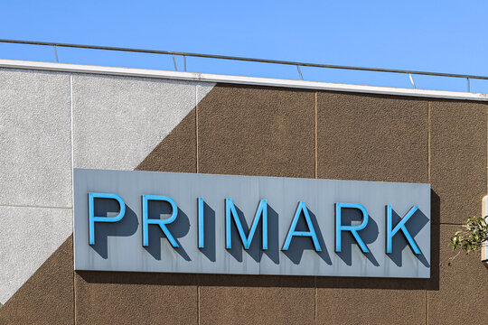 Primark brand logo. Sign on the facade of a clothing store chain.