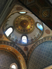 Interior dome ceiling with geometric detailing and ornate architectural elements Concentric...
