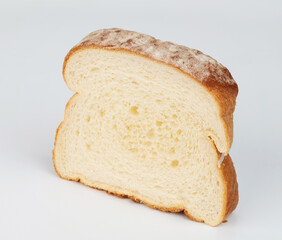 Freshly sliced white bread perfect for sandwiches or toast served on plain background