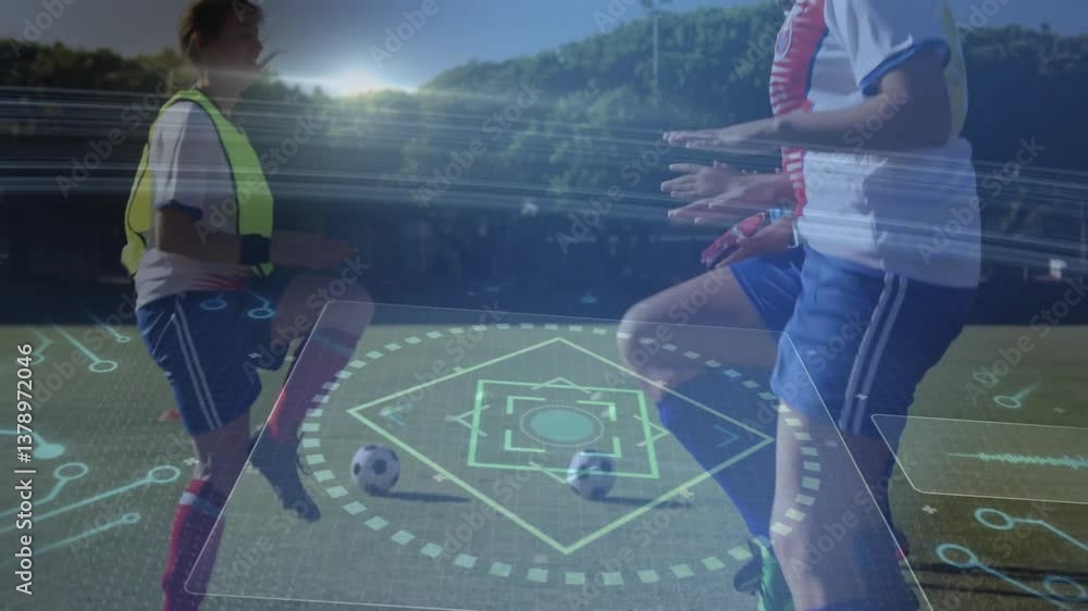 Poster practicing on field, soccer players with animation digital data overlay visible
