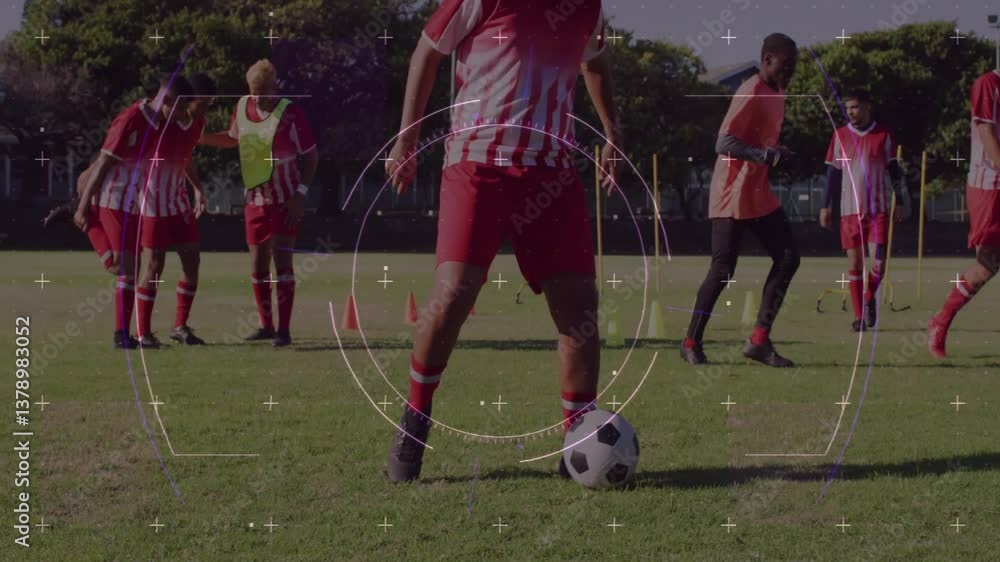 Aufkleber young soccer players practicing on field with digital targeting animation overlay