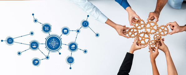 Hands working together connect gears and symbols that represent collaboration, innovation, and global communication in a modern business environment. Amity