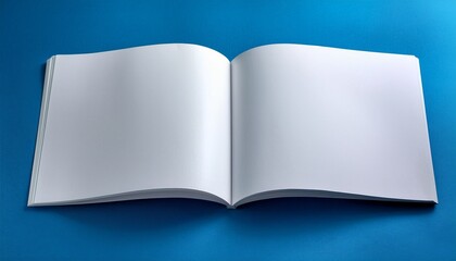 mock up of blank white book on a blue background opened centerfold display
