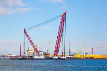 A huge floating crane in the seaport.