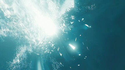   The sun illuminates brilliantly through the water, reflecting off the surface of the water