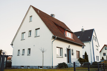 This Charming Residential House features a stunning Modern Design and is surrounded by lush greenery, all situated in a peaceful and quiet neighborhood that enhances the appeal of community living