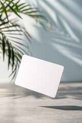 A clean, minimalist white sticker mockup with a blank surface, perfect for branding, logo designs, labels, and product presentation. High-resolution and customizable