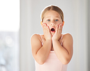 Portrait, dancer and girl in studio, surprise and announcement with good news, wellness and expression. Face, ballerina or kid with emoji, shocked and winner with creative or reaction for opportunity