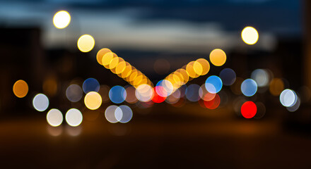 Fototapeta premium Bokeh Bliss: Night Lights Dance in a Dreamy, Abstract Urban Symphony of Color & Blur
