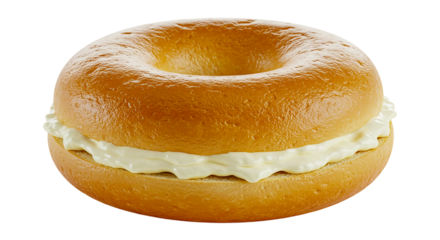 Close up of a golden bagel filled with creamy white cream cheese ready to be eaten for breakfast