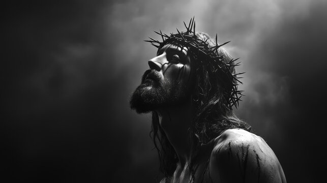 Black and White Portrait of Jesus Christ with Crown of Thorns &ndash; Side View in a Misty, Dramatic Atmosphere