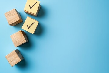 The concept of a checklist is represented by a wooden cube with a check mark on it, placed on a blue background with room for copying