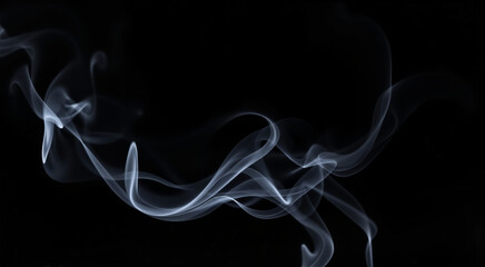 Obraz premium Abstract smoke patterns rising against a dark background. Captivating swirls of smoke create a sense of mystery and artistry.
