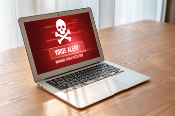 Virus warning alert on computer screen detected modish cyber threat , hacker, computer virus and...