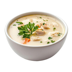 creamy chicken soup in a white bowl, side perspective with fresh herbs

