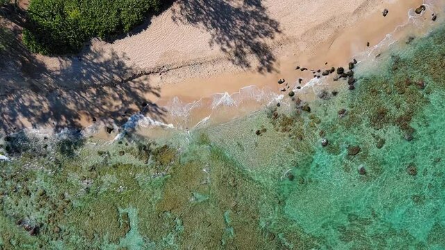 Aerial view of clear water at Chun's reef beach on North Shore of Oahu, Hawaii