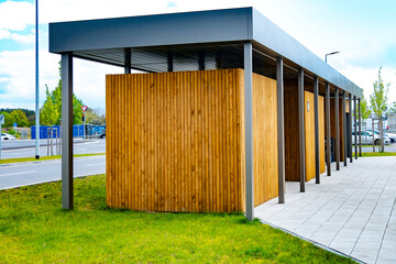 Fototapeta premium automated public restroom, Euro coins or app-based, Modern European public toilet entrance, urban convenience, Berlin, Germany, Automated cleaning system