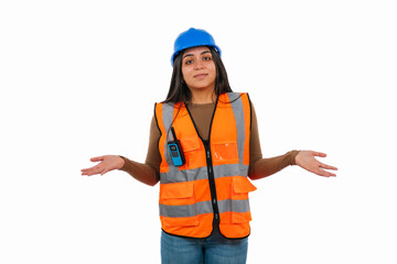Latina construction worker shrugging shoulders wearing safety vest and hardhat