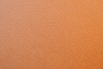 Textured orange paper background for creative projects