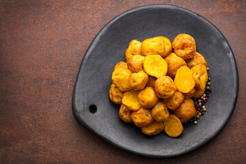 Fried yellow creole potatoes are a popular food of Latin American peoples - Solanum phureja.