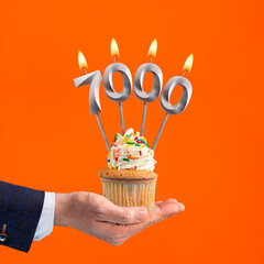 Number of followers or likes - Candle number 7000